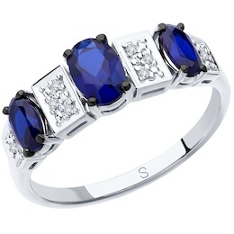 Кольцо из белого золота с бриллиантами и синими корунд (синт.) 6012144